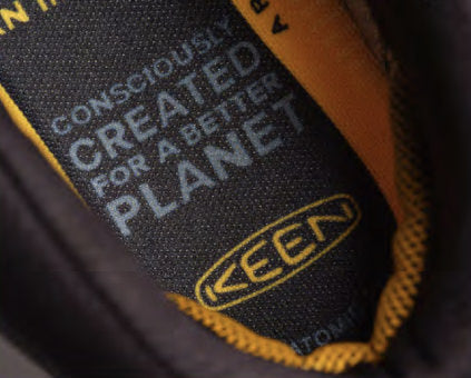 Close-up of insole of Keen shoe reading "consciously created for a better planet"