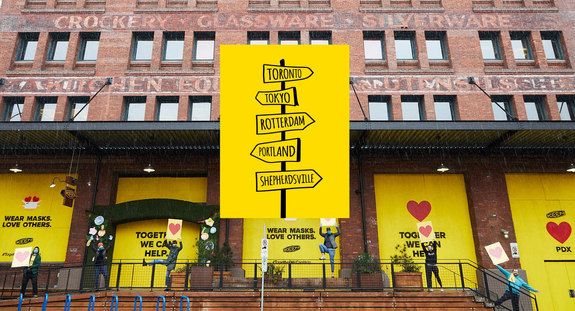 KEEN headquarters in Portland with "Together we can help" signage in windows.